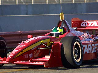 Bruno Junqueira, of Belo Horizonte, Brazil, guides his Ford-Cosworth Lola  for Neman/Haas Racing through the nine turn of the course of the Grand Prix  of Denver with other racers behind him on